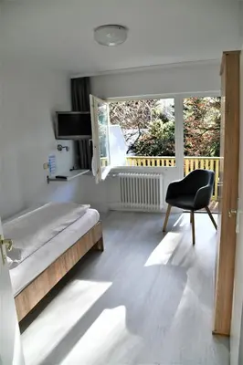 Ein Bett oder Betten in einem Zimmer der Unterkunft Haus am Bach