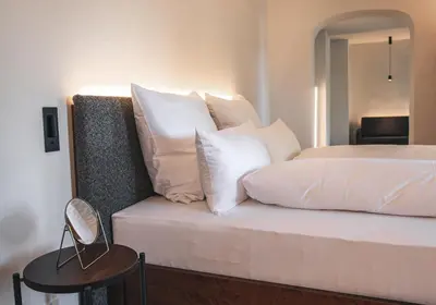 Ein Bett oder Betten in einem Zimmer der Unterkunft Suiten Zantl
