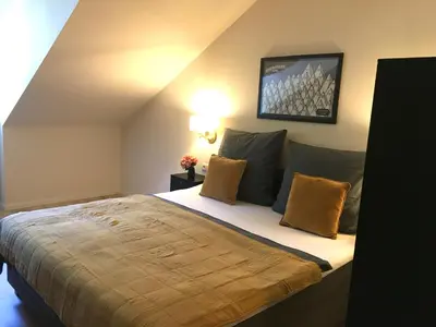 Ein Bett oder Betten in einem Zimmer der Unterkunft Appartment Schloss-Zeit