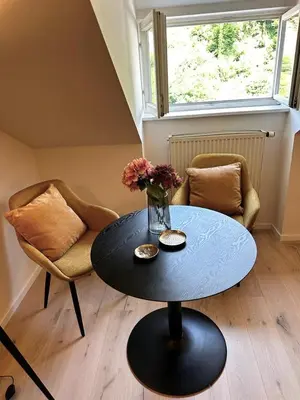 Ein Sitzbereich in der Unterkunft Appartment Schloss-Zeit