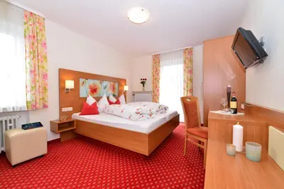 Ein Bett oder Betten in einem Zimmer der Unterkunft Hotel Marienhof