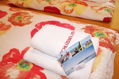 Ein Bett oder Betten in einem Zimmer der Unterkunft 'Kampm'blick