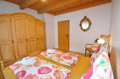 Ein Bett oder Betten in einem Zimmer der Unterkunft 'Kampm'blick