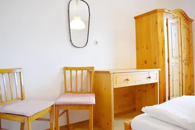 Ein Bett oder Betten in einem Zimmer der Unterkunft Alpenzauber