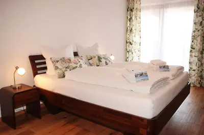 Ein Bett oder Betten in einem Zimmer der Unterkunft Bachlauf