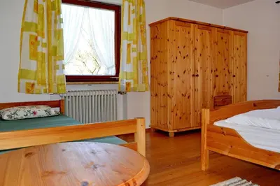 Ein Bett oder Betten in einem Zimmer der Unterkunft Bergblick