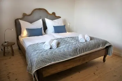 Ein Bett oder Betten in einem Zimmer der Unterkunft Birkenwind