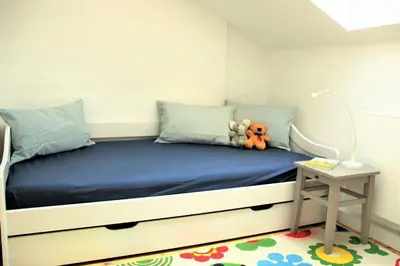 Ein Bett oder Betten in einem Zimmer der Unterkunft Birkenwind