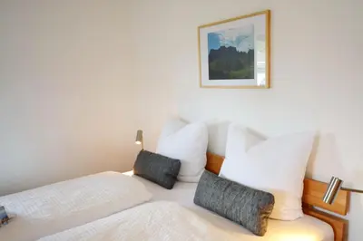 Ein Bett oder Betten in einem Zimmer der Unterkunft ChiemseeKoje