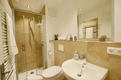 Ein Badezimmer in der Unterkunft Ferienresidenz Chiemseestrand - Apartment 10