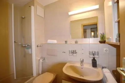 Ein Badezimmer in der Unterkunft Ferienresidenz Chiemseestrand - Apartment 24
