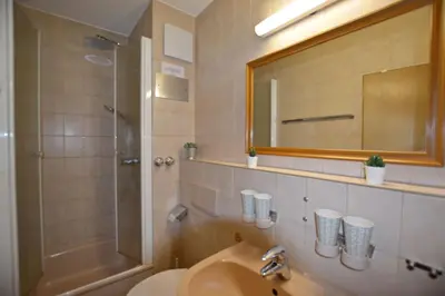 Ein Badezimmer in der Unterkunft Ferienresidenz Chiemseestrand - Sunset 17
