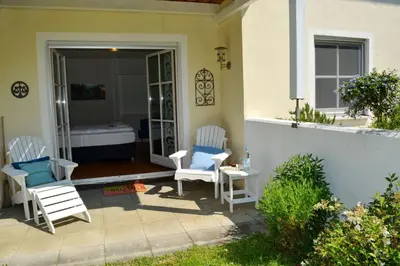 Ein Sitzbereich in der Unterkunft Gartenparadies