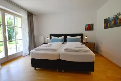 Ein Bett oder Betten in einem Zimmer der Unterkunft Gartenparadies
