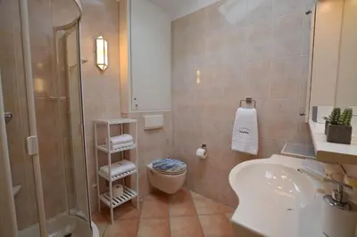 Ein Badezimmer in der Unterkunft Haus Bergliebe