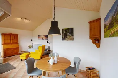 Ein Sitzbereich in der Unterkunft Haus Bergliebe