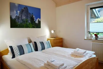 Ein Bett oder Betten in einem Zimmer der Unterkunft Haus Bergliebe