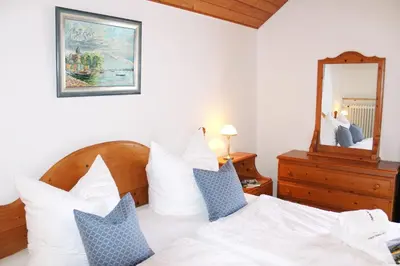 Ein Bett oder Betten in einem Zimmer der Unterkunft Haus Magnolia