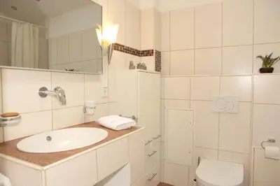 Ein Badezimmer in der Unterkunft Haus Watzmann