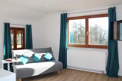 Ein Sitzbereich in der Unterkunft Landsitz SeeBlick