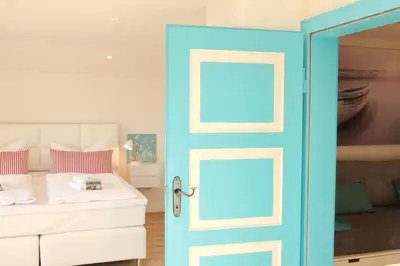Ein Bett oder Betten in einem Zimmer der Unterkunft Landsitz SeeBlick