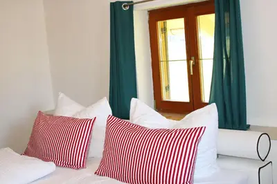 Ein Bett oder Betten in einem Zimmer der Unterkunft Landsitz SeeBlick