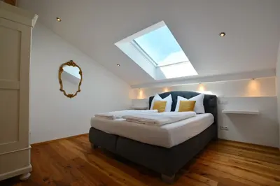 Ein Bett oder Betten in einem Zimmer der Unterkunft Meisterhof - Bergblick