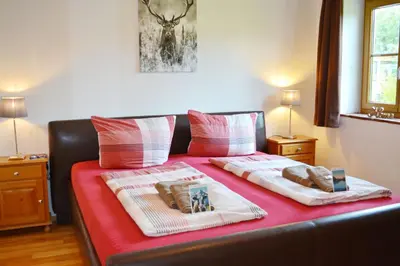 Ein Bett oder Betten in einem Zimmer der Unterkunft Meisterhof - Hartsee