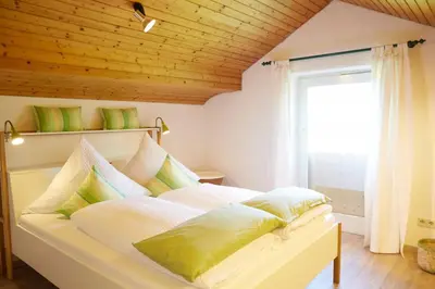 Ein Bett oder Betten in einem Zimmer der Unterkunft SeenParadies