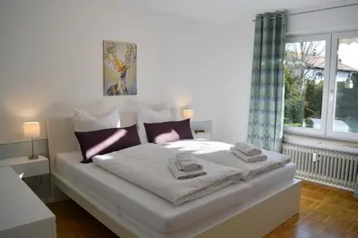 Ein Bett oder Betten in einem Zimmer der Unterkunft Sommerland