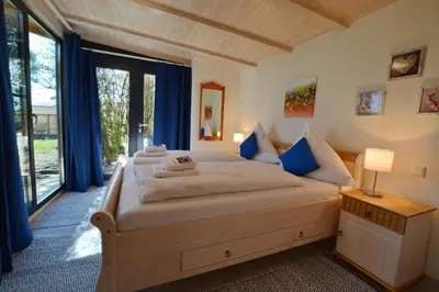 Ein Bett oder Betten in einem Zimmer der Unterkunft TraumBlick