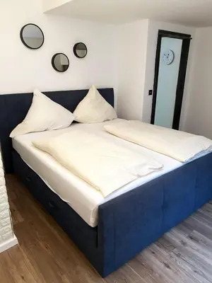 Ein Bett oder Betten in einem Zimmer der Unterkunft Magnolia
