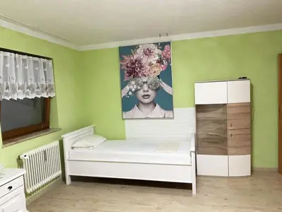 Ein Bett oder Betten in einem Zimmer der Unterkunft Magnolia