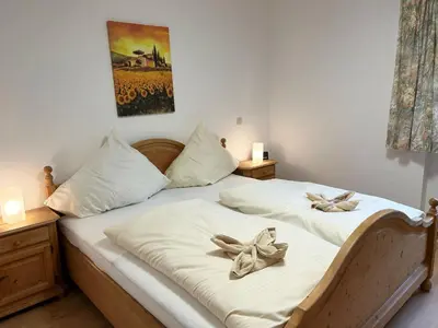 Ein Bett oder Betten in einem Zimmer der Unterkunft Magnolia