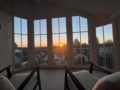 Blick auf den Sonnenuntergang/Sonnenaufgang von der Ferienwohnung aus oder aus der Nähe