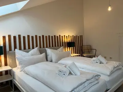 Ein Bett oder Betten in einem Zimmer der Unterkunft Unglaublicher Seeblick I Sunset