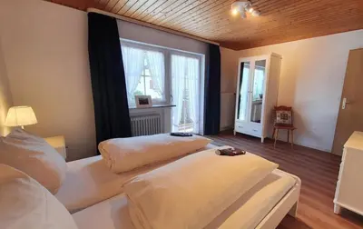 Ein Bett oder Betten in einem Zimmer der Unterkunft Melli -102-