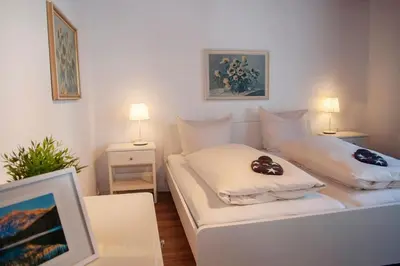 Ein Bett oder Betten in einem Zimmer der Unterkunft Melli -102-