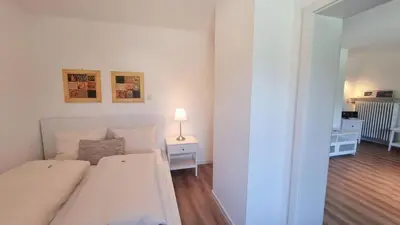 Ein Bett oder Betten in einem Zimmer der Unterkunft Mika -101-
