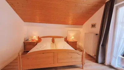 Ein Bett oder Betten in einem Zimmer der Unterkunft Mariandl -103-