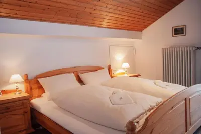 Ein Bett oder Betten in einem Zimmer der Unterkunft Mariandl -103-