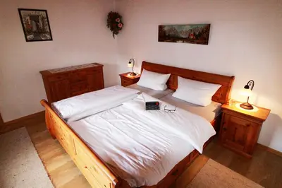 Ein Bett oder Betten in einem Zimmer der Unterkunft St Lukas Apartments