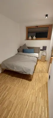 Ein Bett oder Betten in einem Zimmer der Unterkunft Holzer 2.0