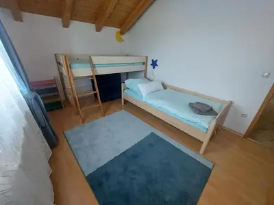 Ein Bett oder Betten in einem Zimmer der Unterkunft Ferienwohnung im Brechstubenweg