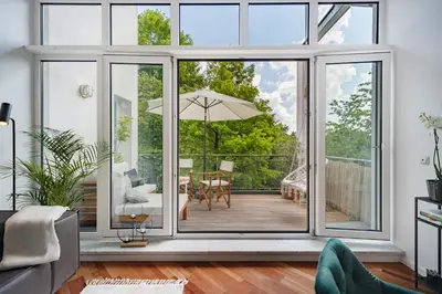 Ein Sitzbereich in der Unterkunft Blueberry Living - Design Loft nahe München - Dachterrasse - S-Bahn