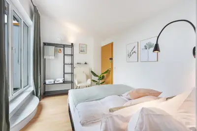 Ein Bett oder Betten in einem Zimmer der Unterkunft Blueberry Living - Design Loft nahe München - Dachterrasse - S-Bahn