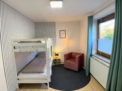 Ein Bett oder Betten in einem Zimmer der Unterkunft 4 Zimmer Wohnung, 6 Bed, Küche, Waschmaschine, Wlan, Garden, free Parking