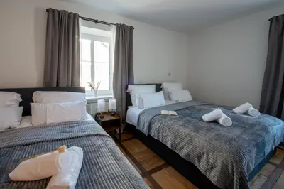 Ein Bett oder Betten in einem Zimmer der Unterkunft BeSSa Homes 6 Personen 2 Schlafzimmer, 3 King Size, Betten, Balkon, Küche