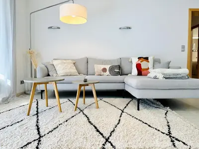 Ein Sitzbereich in der Unterkunft Zentrales City Apartment, Penzberg, 2 Schlafzimmer, Balkon, Parkplatz