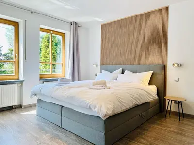 Ein Bett oder Betten in einem Zimmer der Unterkunft Zentrales City Apartment, Penzberg, 2 Schlafzimmer, Balkon, Parkplatz